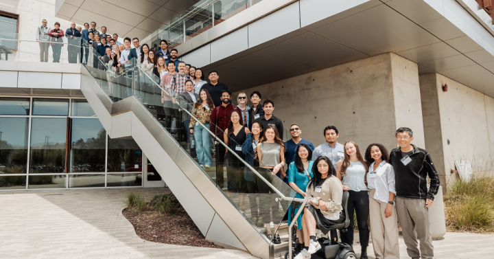 Group photo taken on an outdoor concrete staircase