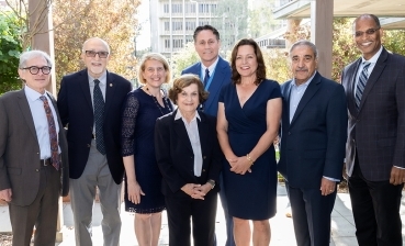 From left, Steven Garfin, MD, interim dean of the School of Medicine; Behrooz Akbarnia, MD; Susan Bukata, MD, chair of the Department of Orthopaedics; Nasrin Owsia, MD; Richard Todd Allen, MD, PhD; Christine Allen; Chancellor Pradeep K. Khosla; and John M. Carethers, vice chancellor for Health Sciences.