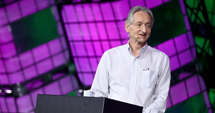 AI pioneer Geoffrey Hinton is pictured speaking on a stage against bold background of purple blocks