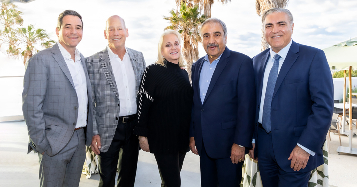 Group photo of Eric Adler, MD, Steven M. Strauss, Lise N. Wilson, Chancellor Pradeep K. Khosla, and Michael M. Madani, MD.