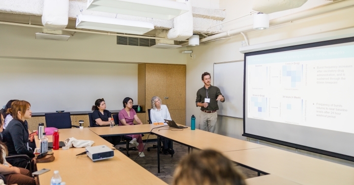 Austin Hutton presenting at the Summer Research Conference at UC San Diego.