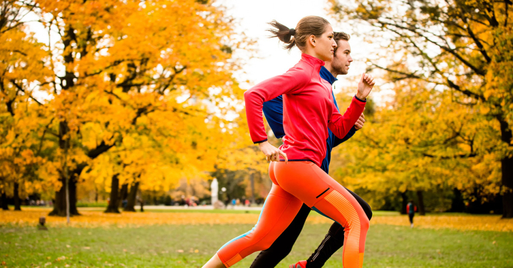 A man and a woman running together 