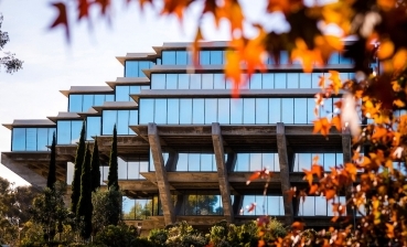 Geisel Library with fall foliage.

