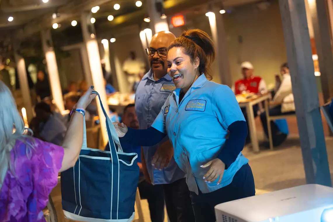 Giveaways included a fully stocked cooler tote bag.