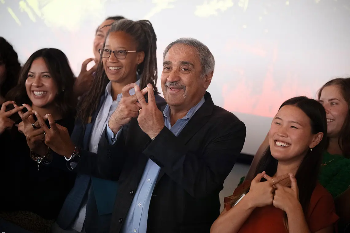 The Chancellor, Provost and students show some Eighth College pride.  