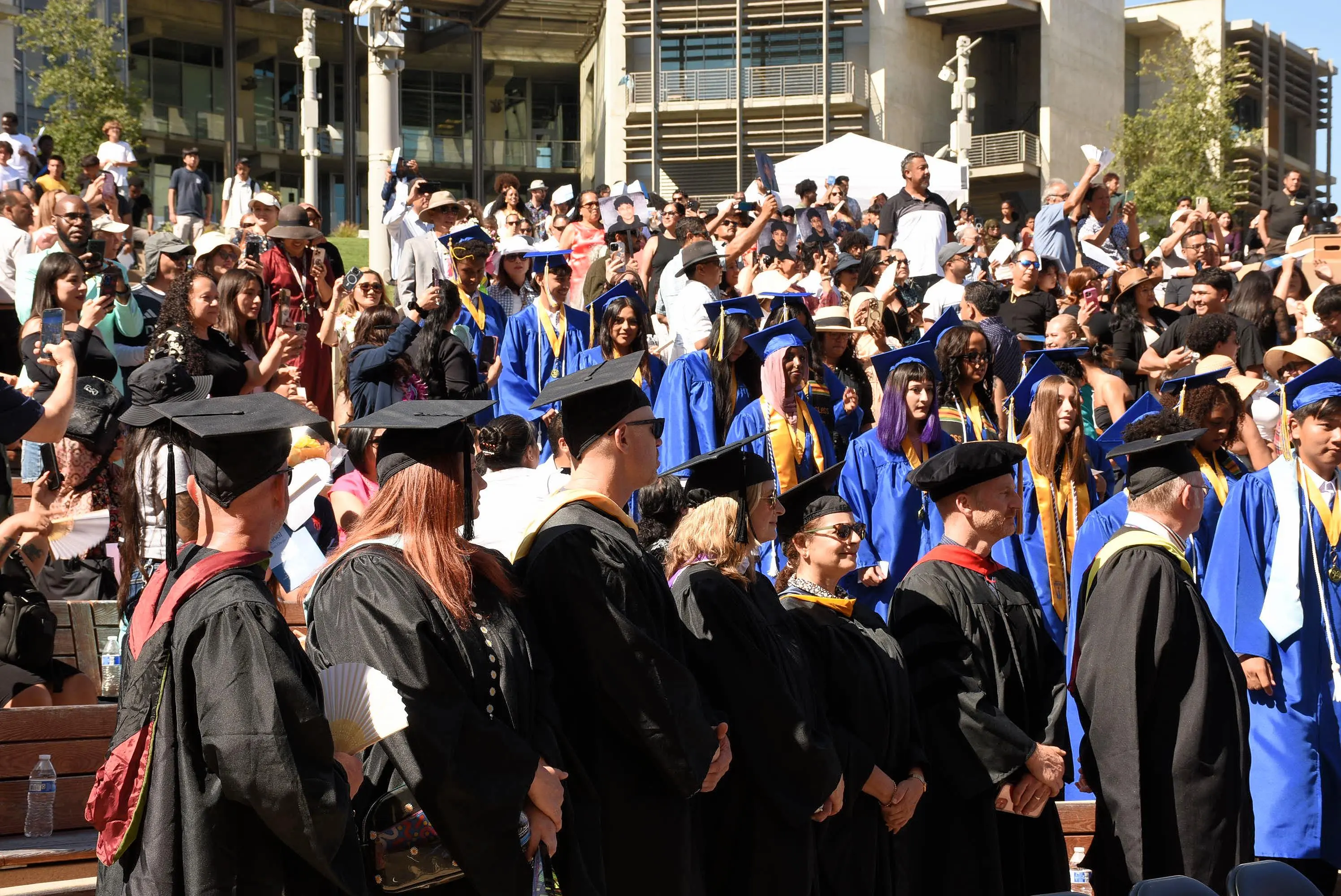 graduates processing into amphitheater