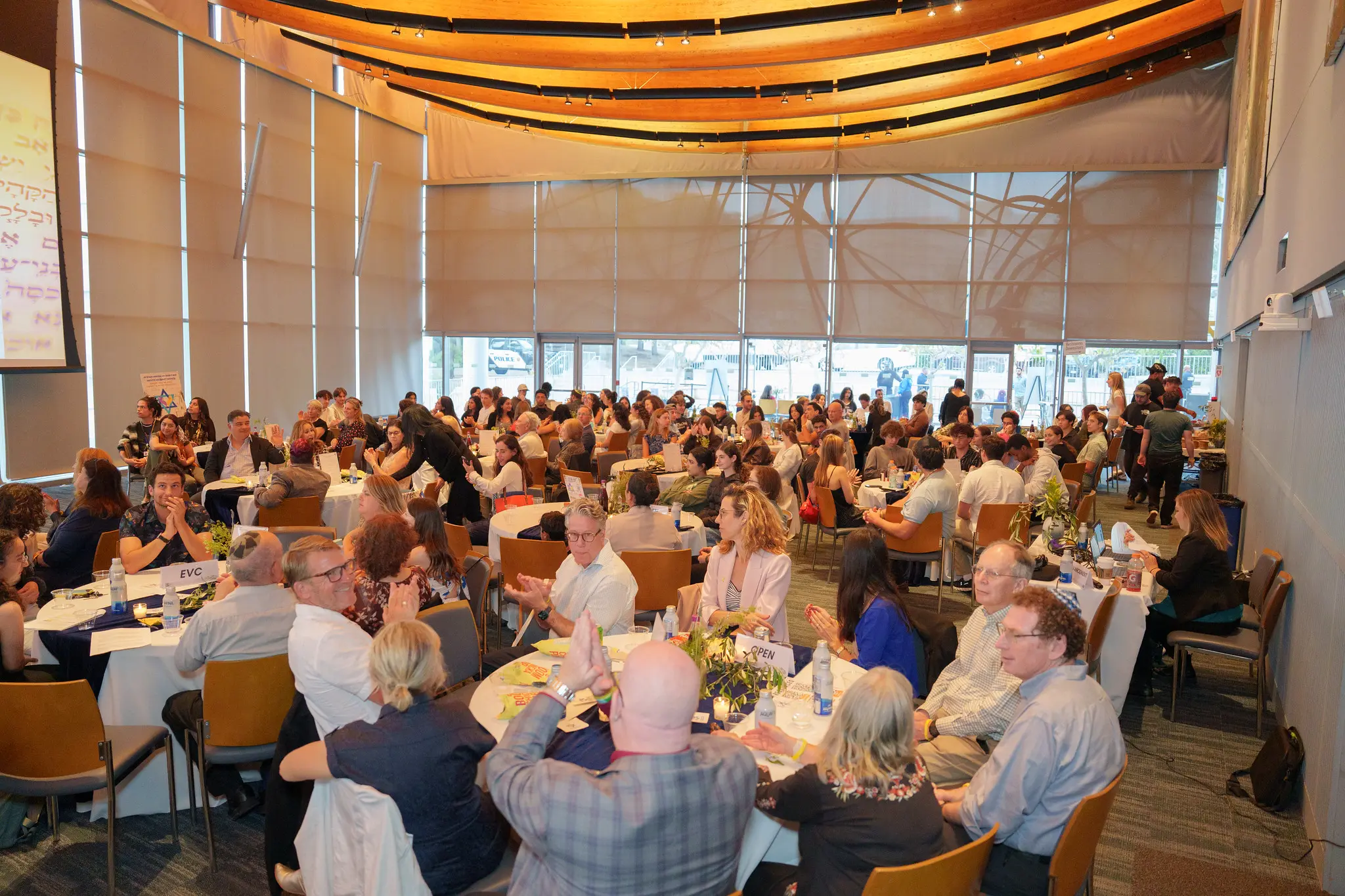 Wide angle shot of people sitting at tables