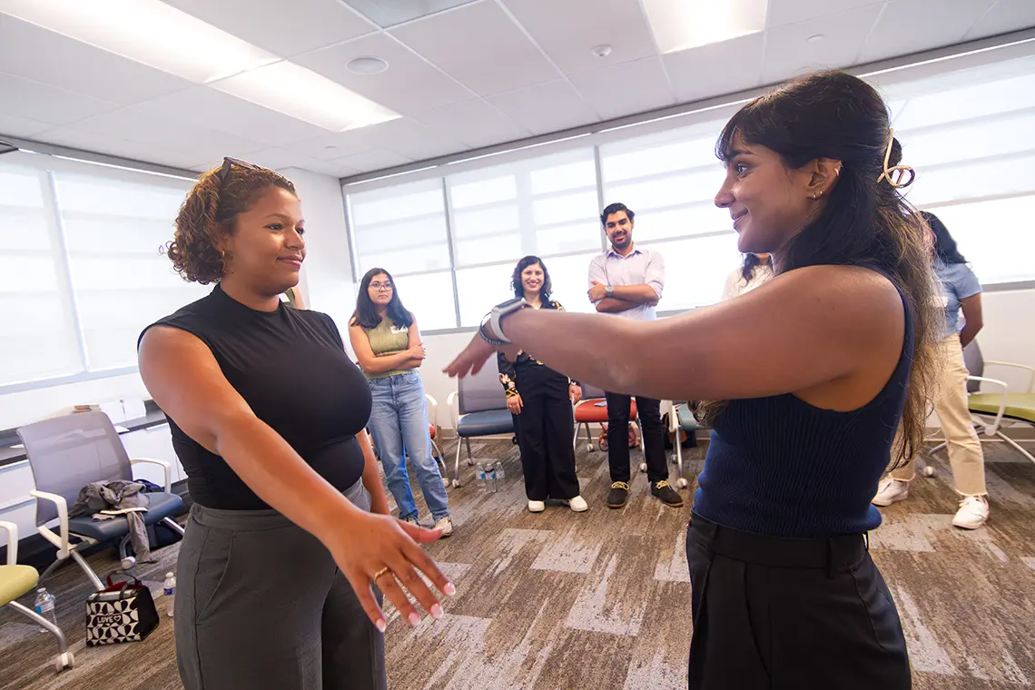 students in a workshop playing interactive games