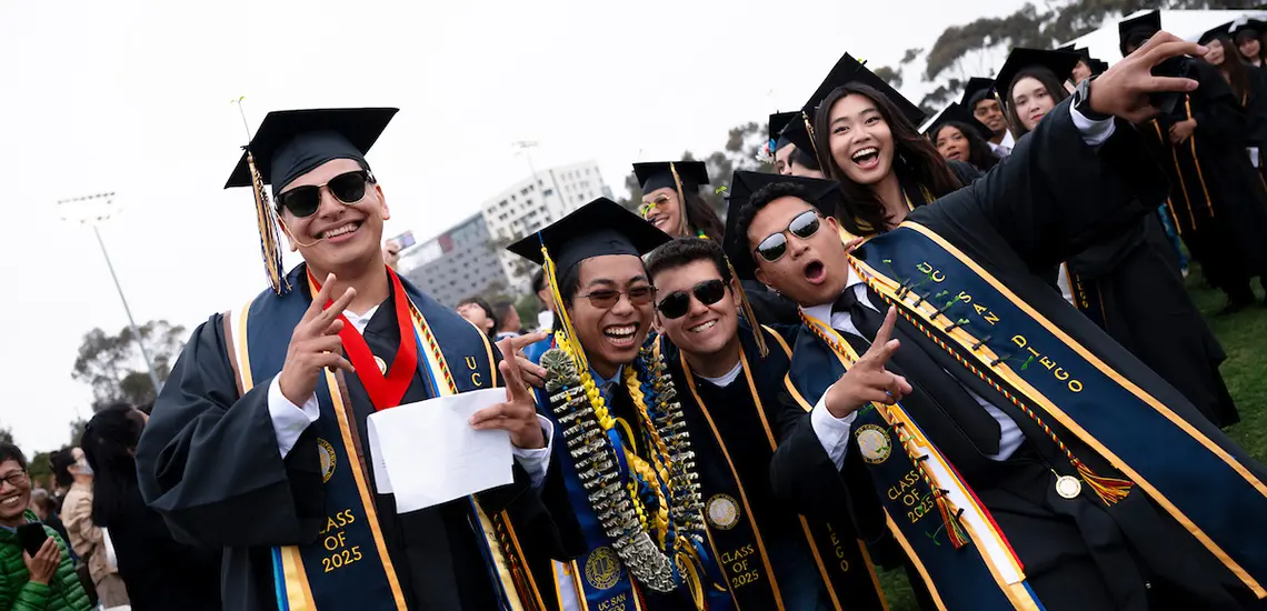 Graduates do trident hand signal