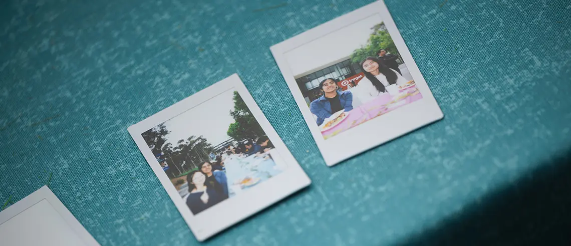 Polaroids on table