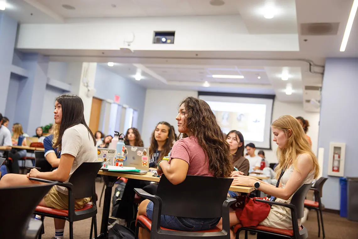 Incoming transfer students listen to a panel of current transfer students .