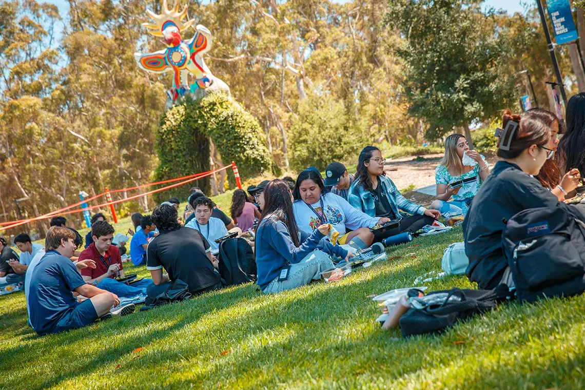 Transfer Prep students enjoy a social picnic together on Sun God Lawn.