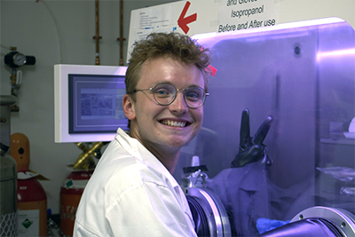 Anton Samoylov working in a lab glove box.