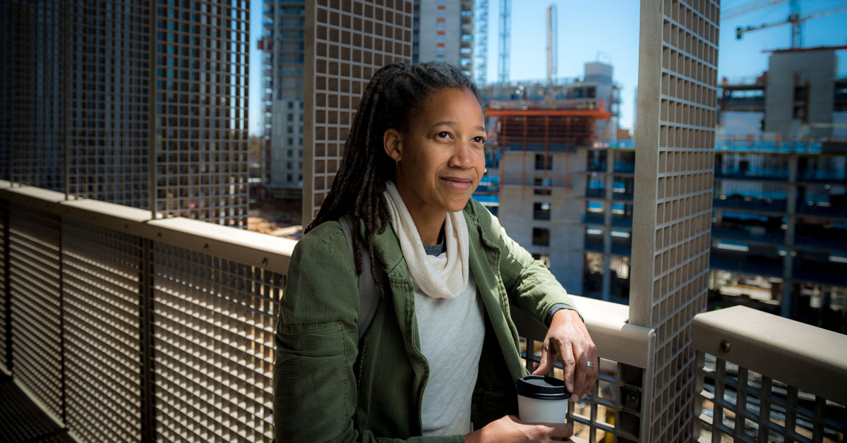 Angela Booker with skyline view in background