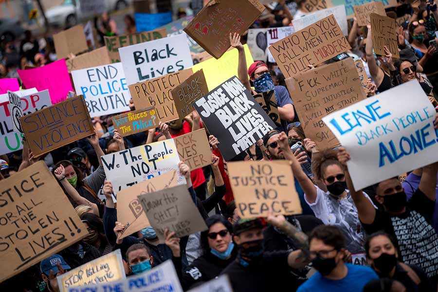 people protesting with signs