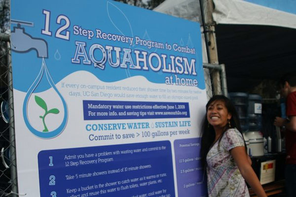 Photo: a student, staff and faculty group on campus, encourages water conservation