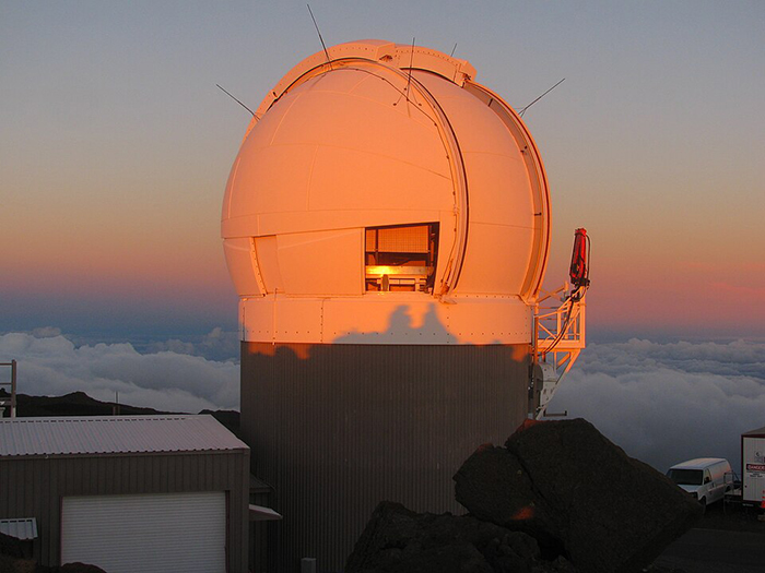 Picture of the Pan-STARRS telescopes at the top of Mount Haleakala in Maui 