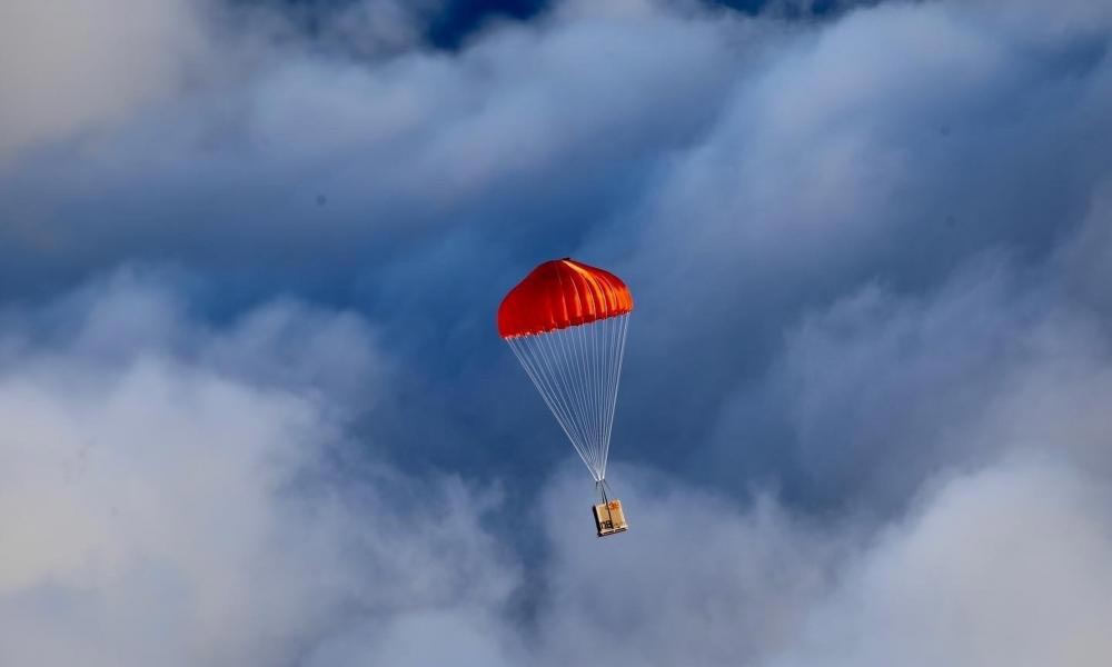 Weather buoys parachutes to the Pacific Ocean after being released by the 53rd Weather Reconnaissance Squadron Hurricane Hunters.