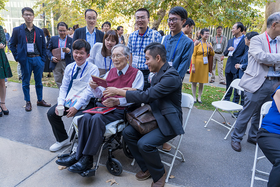 Bert Fung at birthday party with fellow researchers