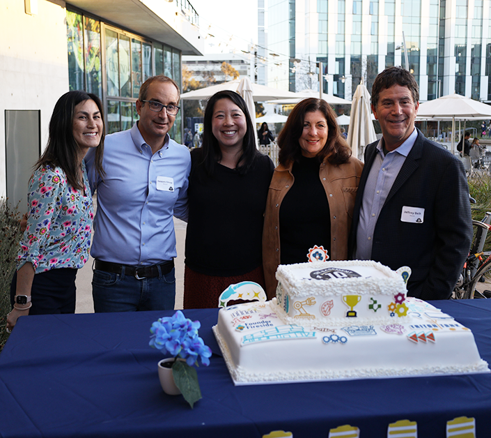 Anniversary attendees were treated to an evening of inspiration and celebration, which even included a cake that had the top layer burn away to unveil The Basement’s new 10-year seal. (Left to right) Melissa Campbell, Jacques Chirazi, and Christine Liou of