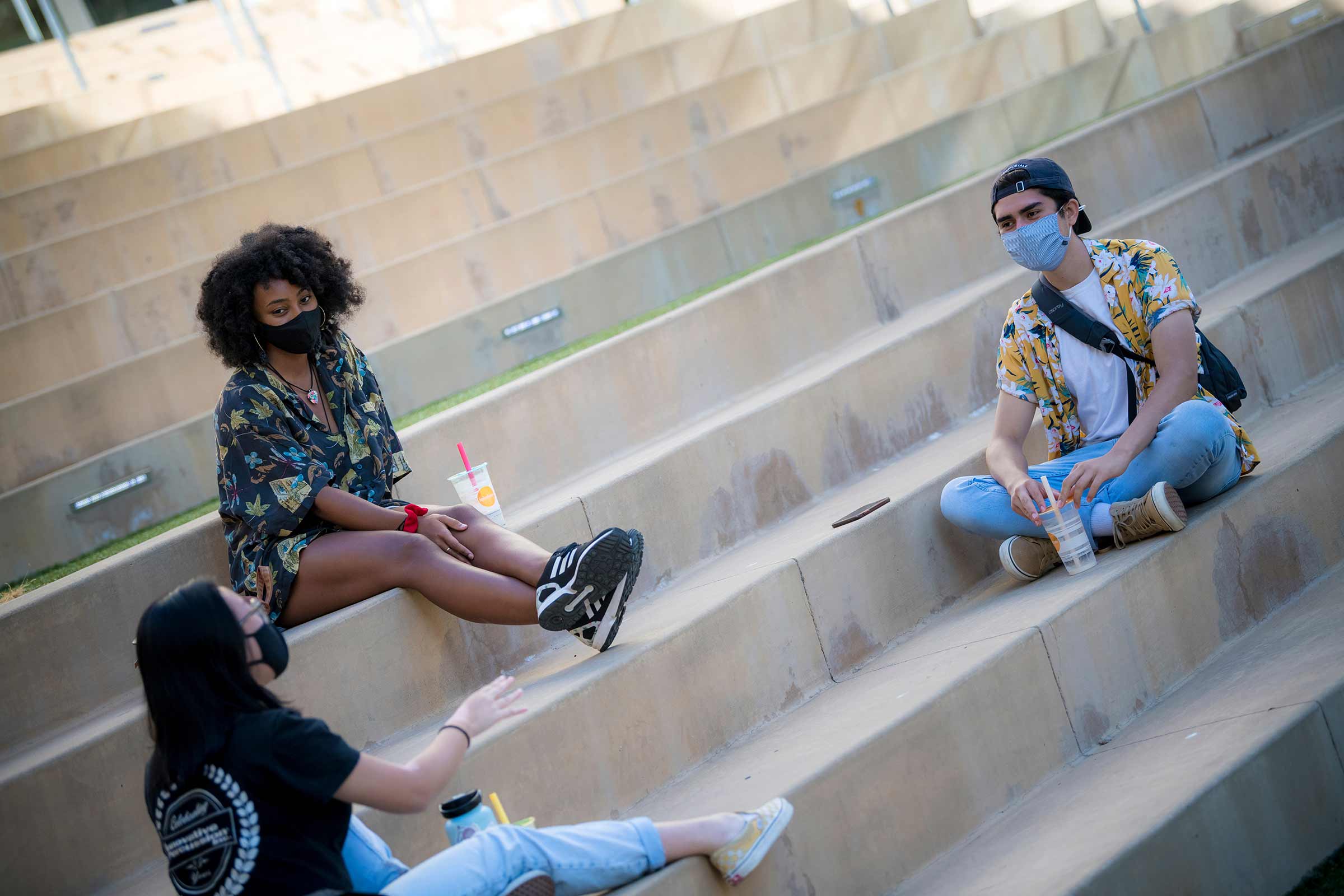 Students on campus in masks.