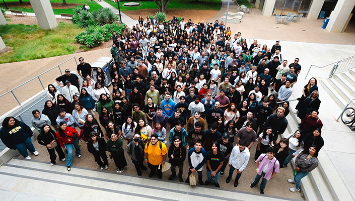 A photo of a large group of students taken from above.