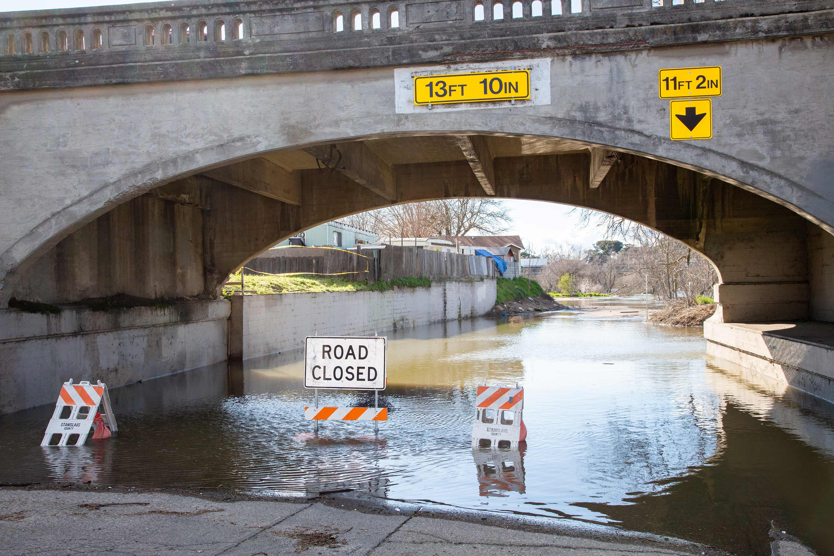 High water levels on the Tuolumne River close River Road in the city of  Modesto, California.
