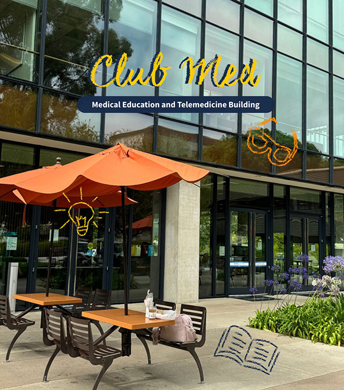 Outdoor tables with orange umbrellas. Text reads 