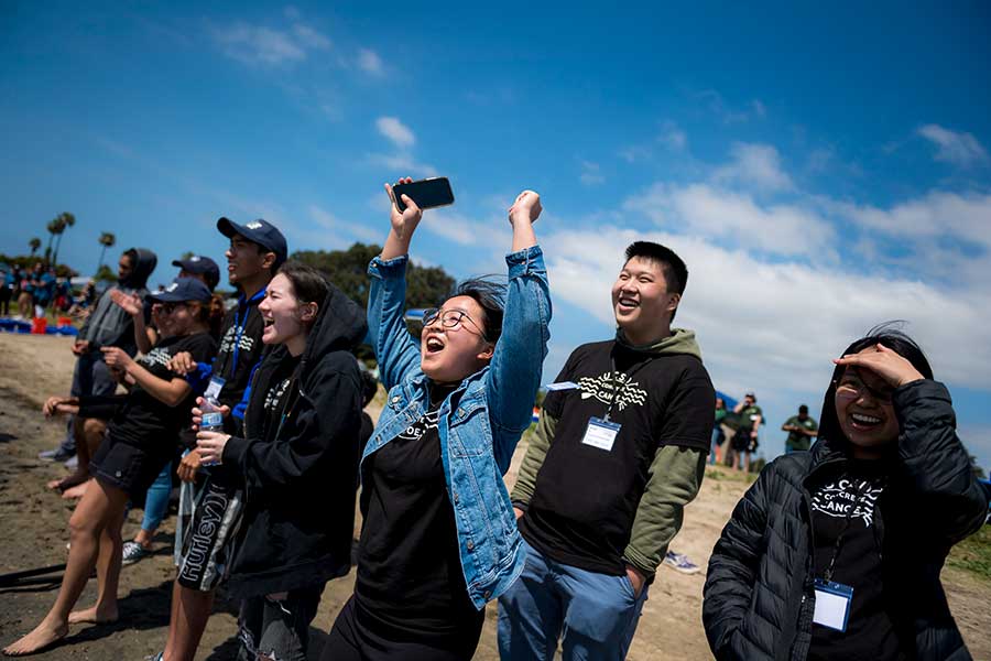 Onlookers cheering on during the concrete canoe competition.