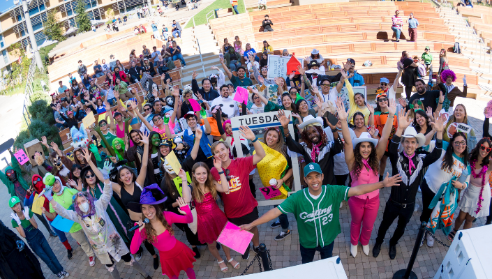 People in costumes at Epstein Family Amphitheater