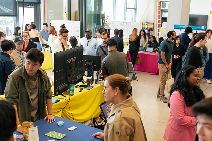 Student innovators shared their big ideas to a large crowd of attendees.