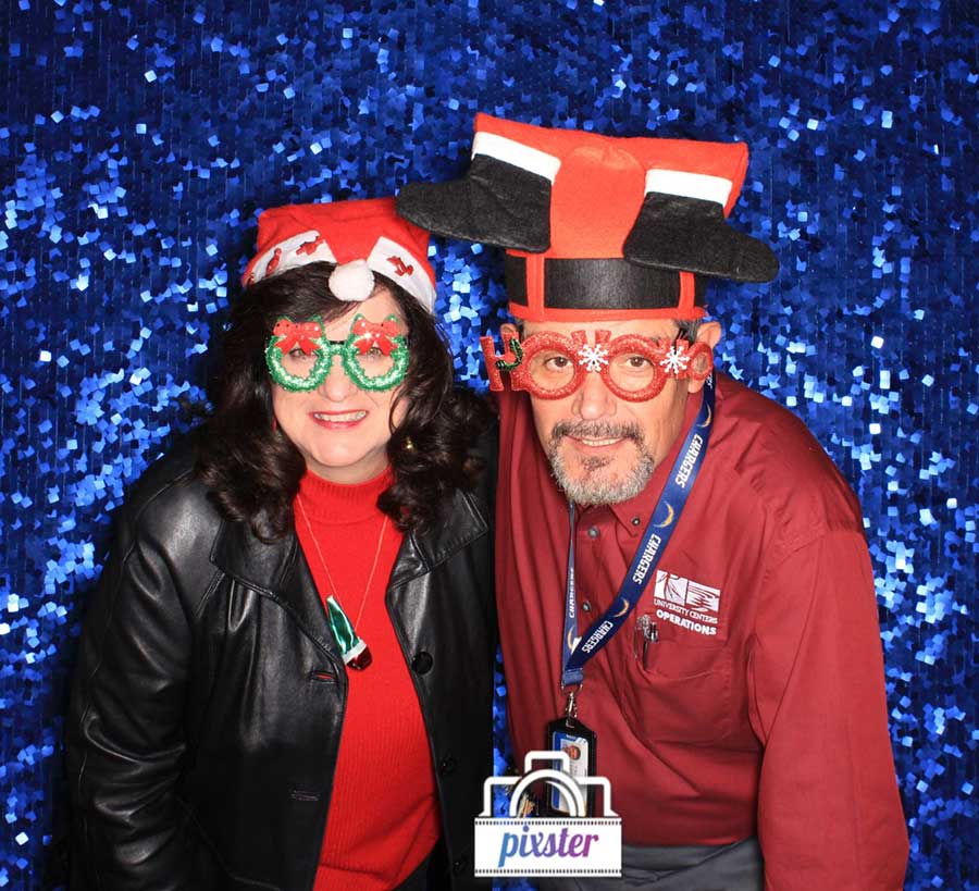 Platero-Lopez at the 2019 Staff Appreciation Holiday Breakfast with her husband.