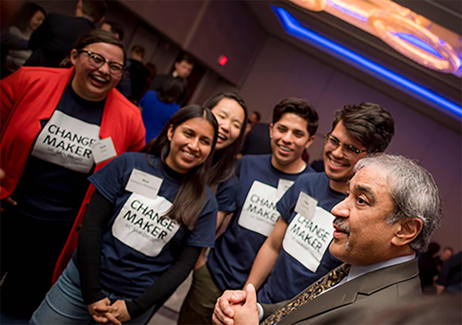Chancellor with students at a Changemaker Institute event.