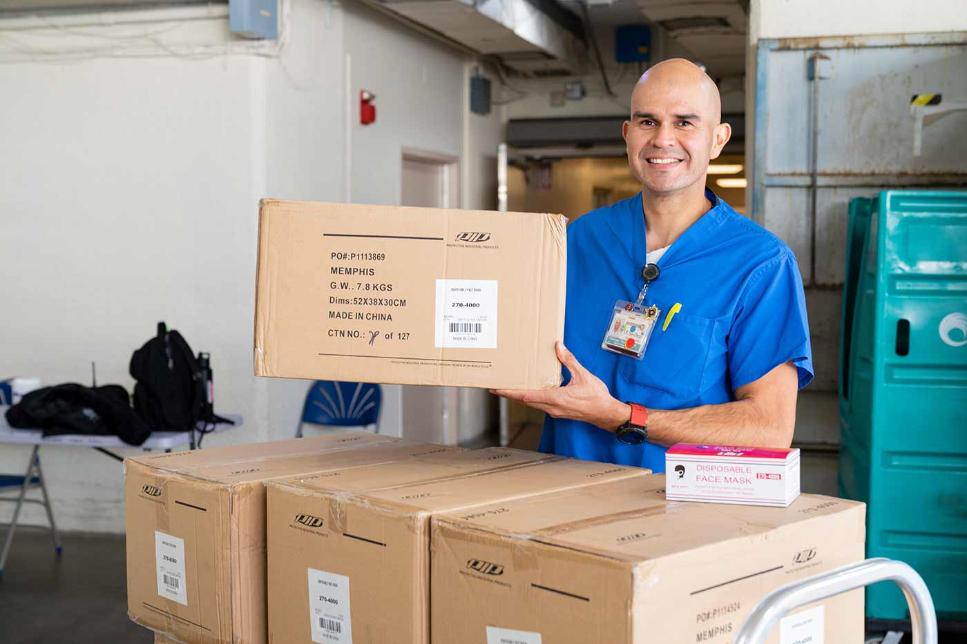 Employee with donation boxes