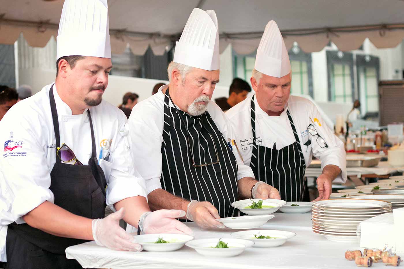 Photo: UC San Diego Executive Chef Vaughn Vargus (right), with UC San Diego chefs Dave Gardinier and Tiago Battastini