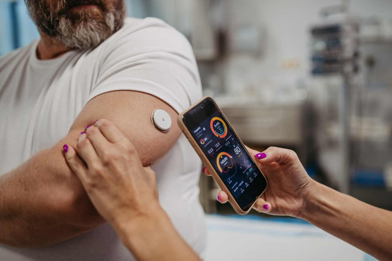 A man checking his glucose levels