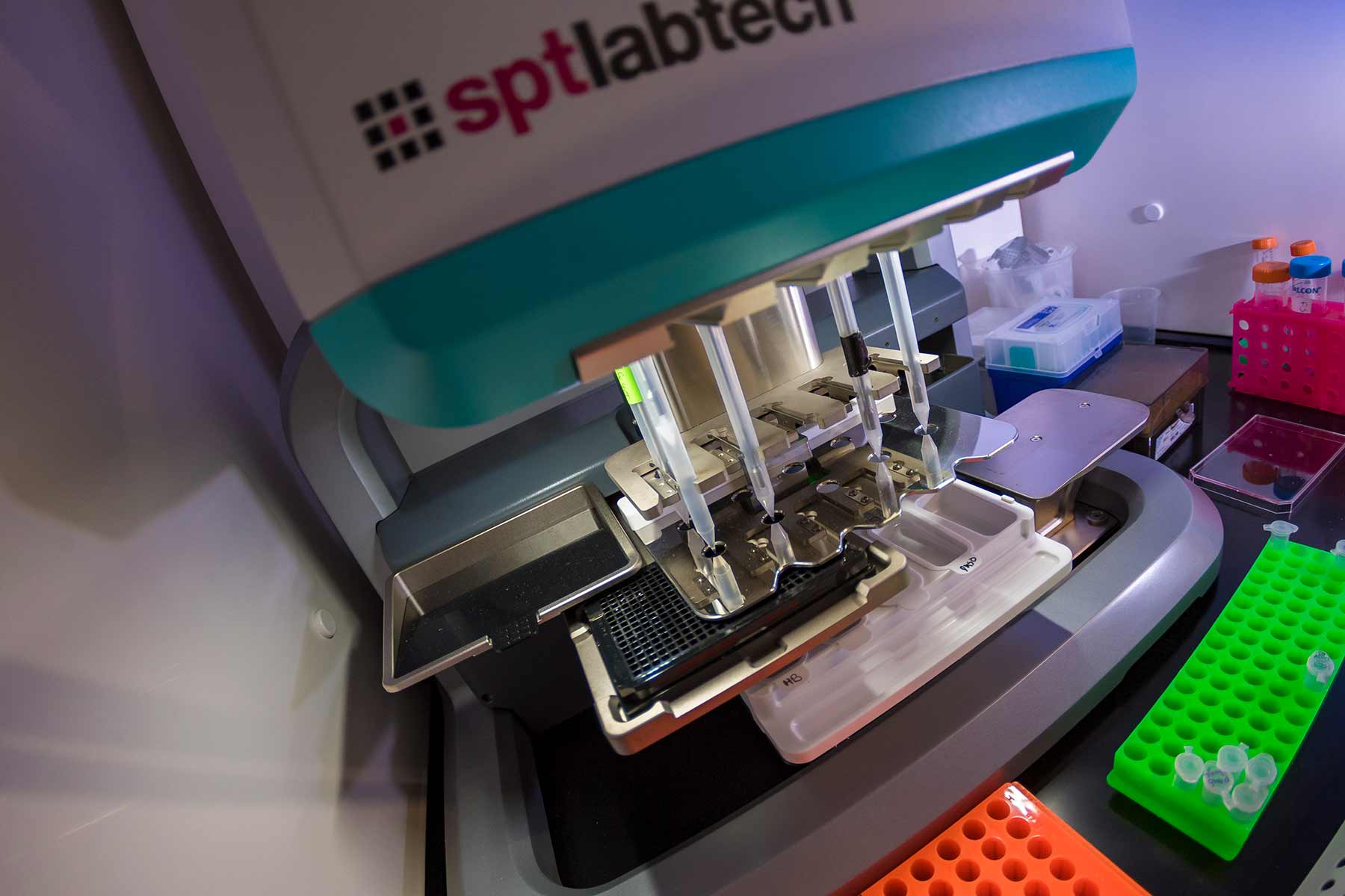 A pipetting robot dilutes samples into a plate for imaging in the Illumina Laboratory.