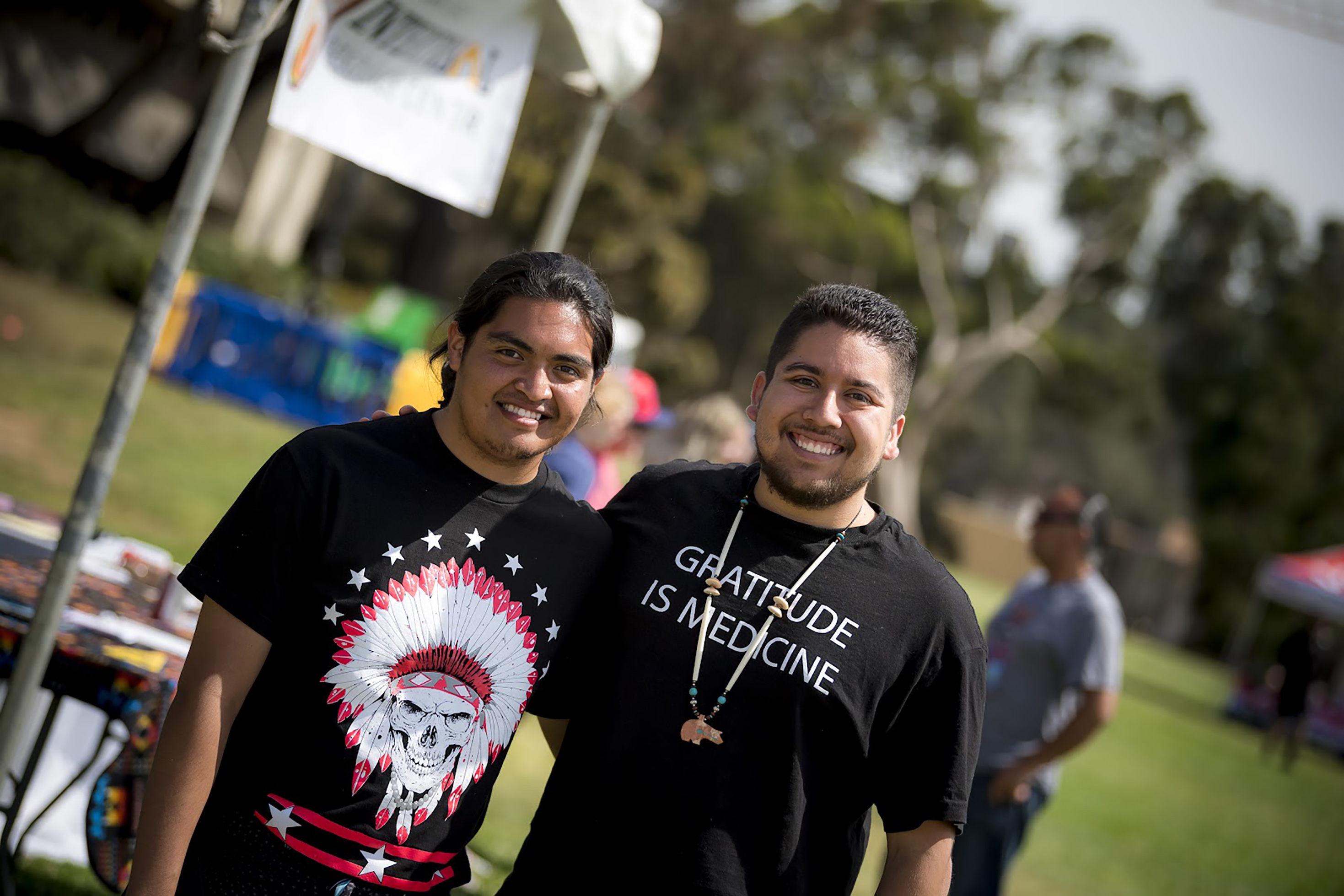 Two UC San Diego students pose at annual powwow event