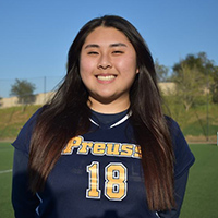 Portrait of Kelly Le, Preuss graduate, in her athletic uniform