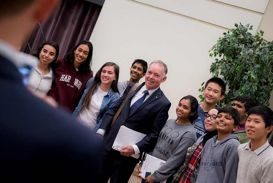 Graham Farquhar with high school students