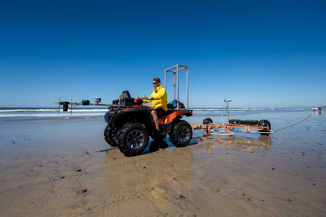 The Coastal Processes Group at Scripps conducts a survey at Torrey Pines State Beach.