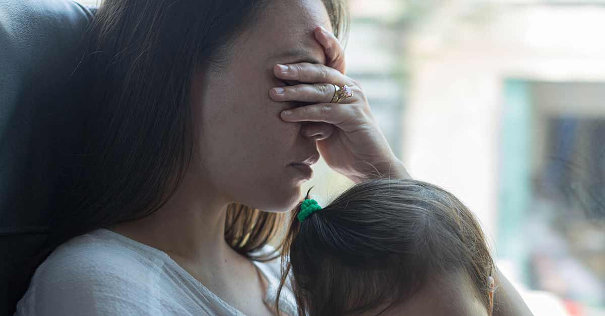 Stock image of mother in distress