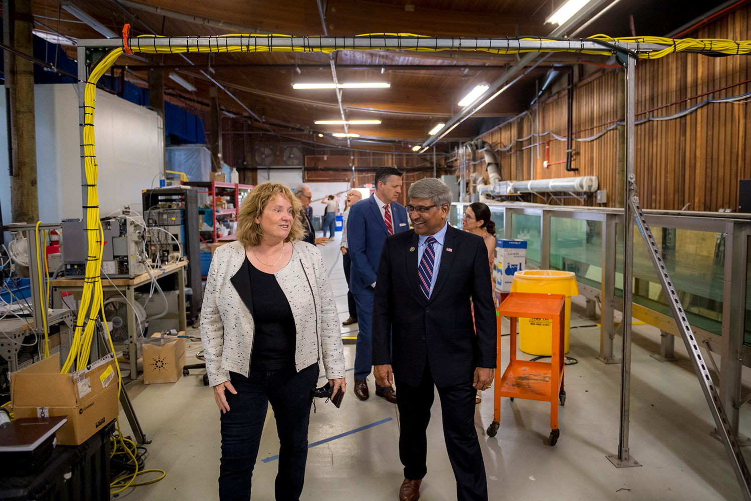 Professor Kimberly Prather with National Science Foundation Director Sethuraman Panchanathan during a tour of the Maker Space in Scripps Institution of Oceanography’s Hydraulics Laboratory.