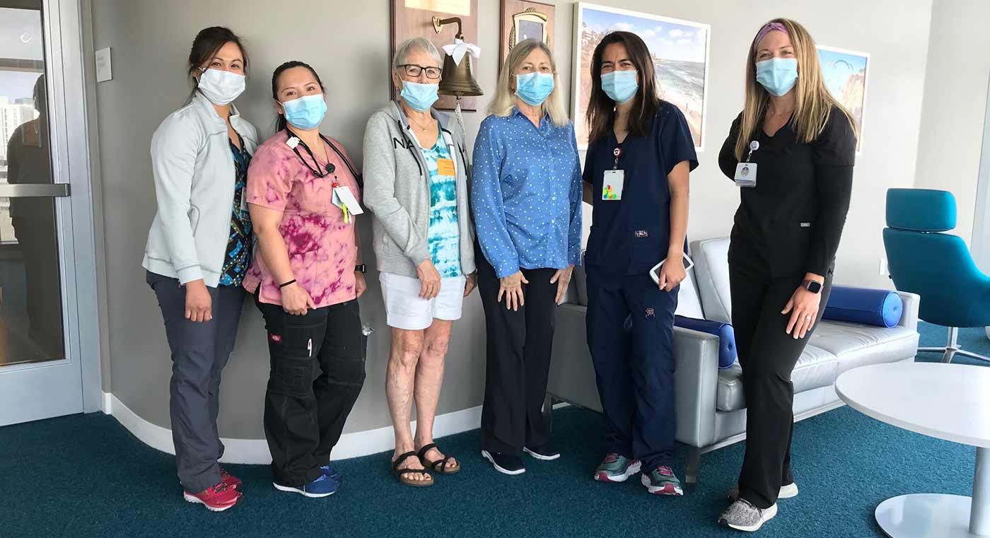 Barbara Gallas with members of her medical team.