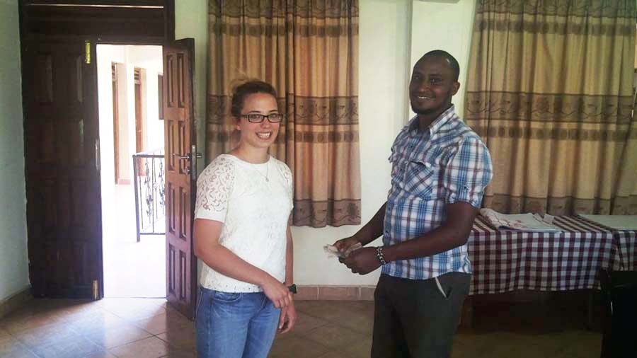 Elizabeth Lyons and a man at a workshop in Kenya