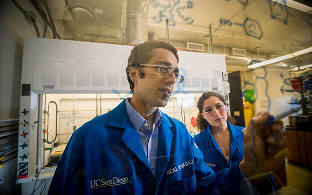 Professor and student in research lab