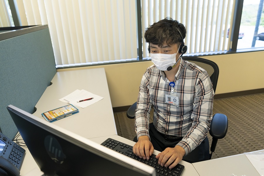 doctor talking on phone with a senior patient