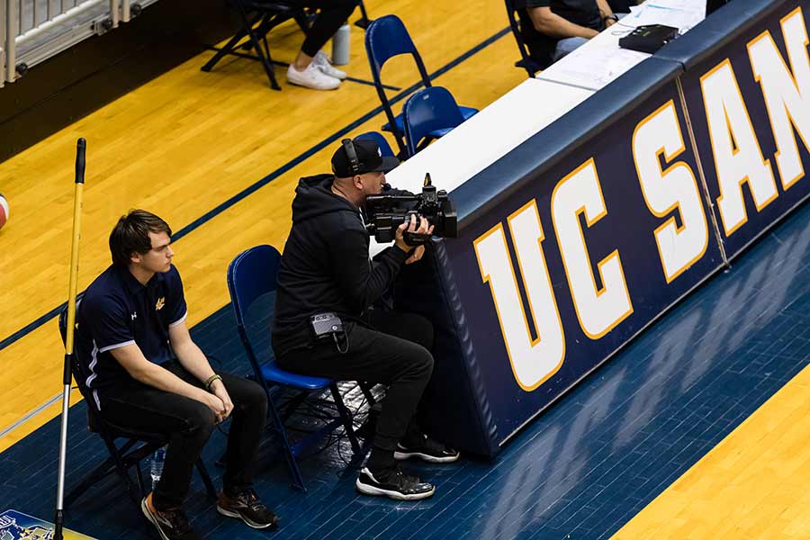 videographer at basketball game