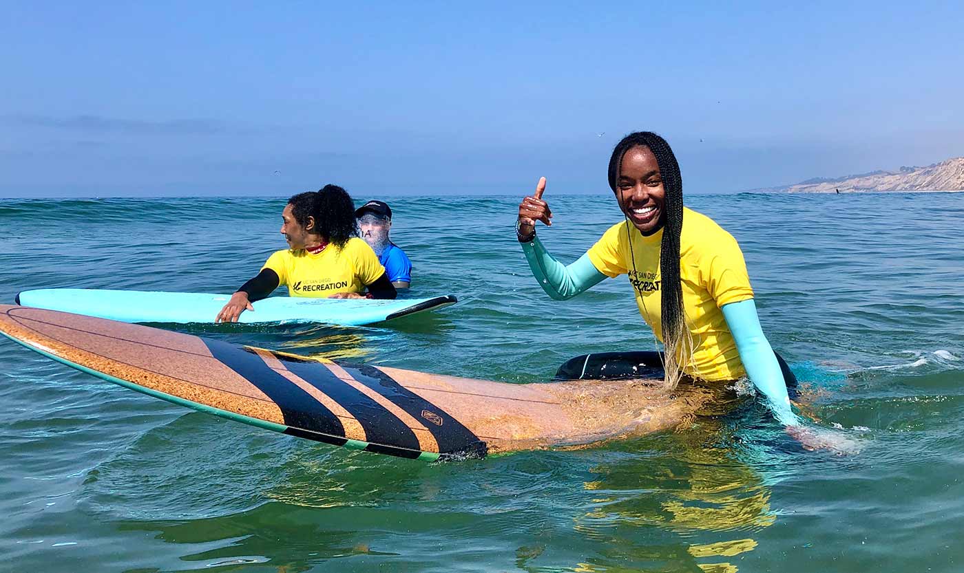 Students surfing.