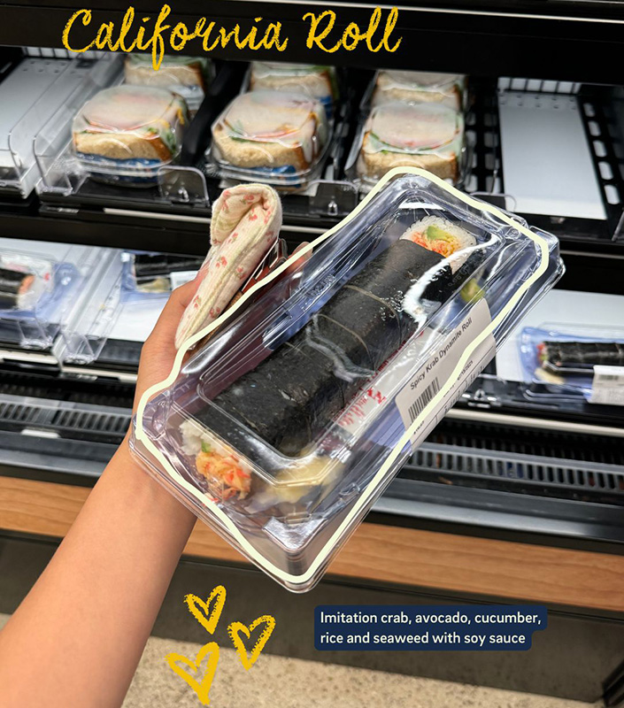 Hand holds package of sushi. Text reads 